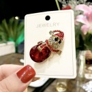 GOLDFINGER RED SNOWMAN BROOCH thumbnail